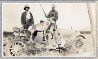 Two hunters with antelope and Hudson Speedwagon