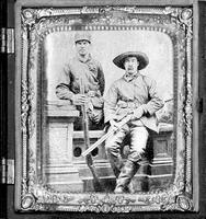 Two Westerners with Winchester rifles