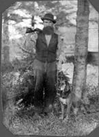 Bearded hunter with dog