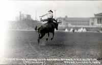 Clyde Kline riding wild Bramah steer, Tex Austin Rodeo Chicago, 1926