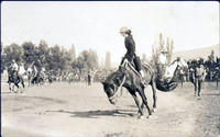 Bonnie McCarroll riding a saddle bronc