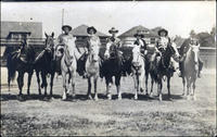 Five cowboys & a cowgirl on horses