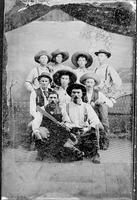 Group portrait of 9 unidentified cowboys