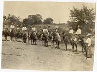Easterners, "Tenderfeet" [11 men and women on horseback, except 1 woman]