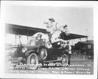 Chief jumping auto loaded with passengers at American Legion Conv. K.C. MO., Leonard Stroud , Rocky