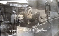 Bonnie McCarrol [sic] riding the Bull "Happy Canyon" Round-Up 1916