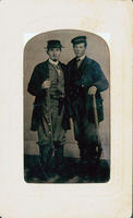 Two well-dressed men with percussion rifles
