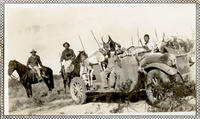 Hunting party with Hudson Speedwagon loaded with carcasses