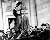 Teddy Roosevelt raising his hat