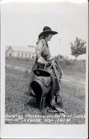Dorothy Morrell and Her Prize Saddle Won at Cheyenne, Wyoming. 1914