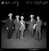 IRM award to Cy Taillon from Bill Schuft (Belle Fourche), Ralph Billings (Woodward, OK), Caroline Se