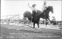 Leonard and Mayme Stroud on Ginger and Black Diamond, hurdle jumping, Colorado State Fair, Pueblo