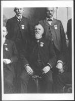 [Capt. John T. Lytle sitting with other men posing for photograph]