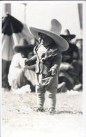 Tommy R. Shelton World's Youngest Cowboy at the Tri-State RoundUp, Belle Fourche, S. D.