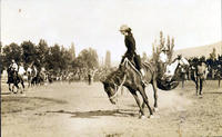 Bonnie McCarroll riding a saddle bronc