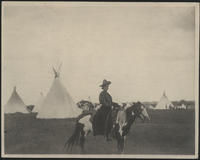 [woman on horseback with tipis in background]
