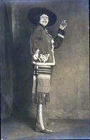 Bonnie McCarroll holding cigarette & wearing Hispanic influenced costume