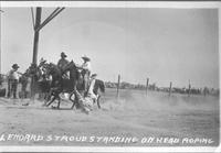 Lenoard [sic] Stroud standing on head roping