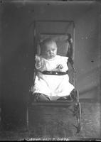 [Single portrait of an Infant in carriage]