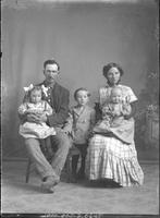 [Single portrait of a group of people and children]