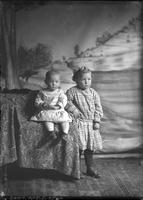 [Single portrait of a Girl and an Infant]