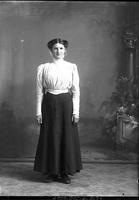 [Single portrait of young Female standing]