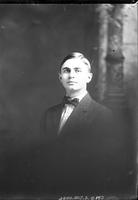 Single portrait of a young Man, L.J. Mayall, sitting