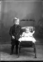 [Single portrait of a young Boy and an Infant]