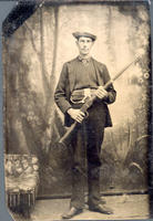 E. L. Van Valkenburg [Hunter with his rifle]