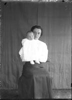 [Single portrait of a person and an child]