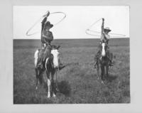 Probably Sam Garrett and Chester Byers as children spinning loops atop horses at the 101 Ranch