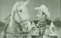 Roy Rogers and Trigger talking things over