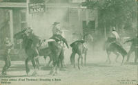 Jesse James (Fred Thomson) directing a bank hold-up