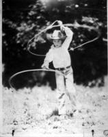 [Junior Eskew, age 7, spinning two ropes]