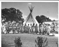 [Indian dancers (men, women, & children) in line]