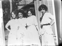[Photograph of a photograph of four young Females]