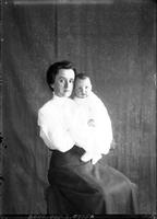 [Single portrait of a person and a child]