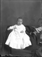 [Single portrait of an Infant in a chair]