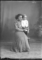 [Single portrait of a person and a child]