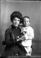 [Single portrait of a person and a child]