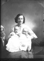 [Single portrait of a person and two children]