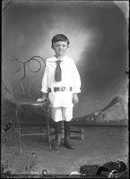 [Single portrait of young Boy wearing a two piece suit]