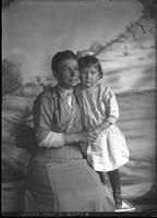 [Single portrait of an adult Female and two young Boys]