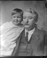 [Single portrait of a person and a child]