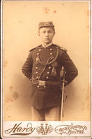 [Young military officer wearing cap and sword]
