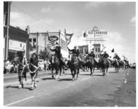 [2 Young Indians leading Men on horses from Lawton]