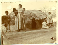 Pima Agency, Arizona, April 1902 [Mother & children standing about Pima ki dwelling]