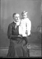 [Single portrait of a person and a child]