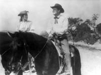 [Barbara Hale & Joel McCrea on horses]