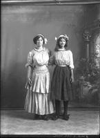 [Single portrait of two young Girls standing]